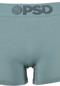 Boxers pour hommes bleu clair avec une taille cousue comportant le logo "PSD" en gris foncé.