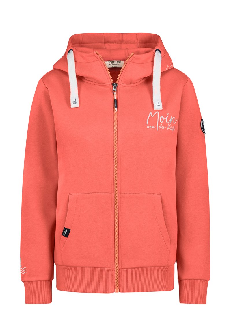 Koraal kleurige zip-up hoodie met witte trekkoorden, voorzakken, geribde manchetten en de tekst "Moin von der Küste" op de borst.
