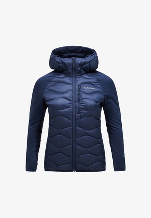 Marine blauwe gewatteerde jas met ritssluiting aan de voorkant, capuchon en gladde mouwen. Kenmerken zijn een borstzak en een zachte, glanzende textuur.