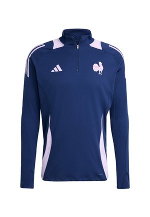 Mornarska atletska majica s polu-zipom, s bijelim i ružičastim akcentima, logom pijetla i dugim rukavima izrađenim od prozračnog materijala.