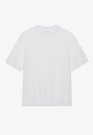 Witte t-shirt met korte mouwen van katoen. Ronde halslijn met een ontspannen pasvorm. Soepele textuur en geen zichtbare patronen of accenten.