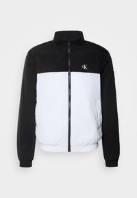 Unselected, bright white/black