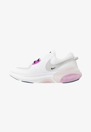 White athletic shoe with a breathable mesh upper, black laces, pink accents, and a cushioned sole featuring a translucent pink section.