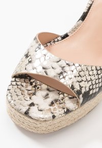Steve Madden Sandales à talons hauts - gold-coloured