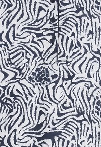 Puma Polotričko - white glow deep navy