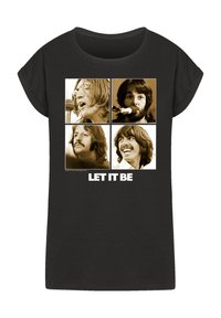 Schwarzes T-Shirt mit kurzen Ärmeln, das vier in Sepiatönen gehaltene Quadrate mit männlichen Figuren zeigt, beschriftet mit "LET IT BE" in fettem weißen Text.
