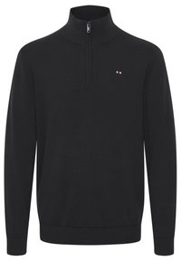 Pull-over noir à col zippé en tissu tricoté doux. Dispose d'un col montant et de poignets côtel és. Petit logo avec des accents rouges, blancs et bleus sur la poitrine.