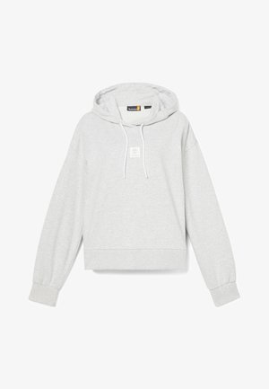 Šviesiai pilka gobtuvinė striukė su laisvu kirpimu, su raišteliais reguliuojamu gobtuvu ir lanksčiais rankogaliais. Priekyje yra maža logotipo siuvinėta detalė, o tekstūra yra švelni.