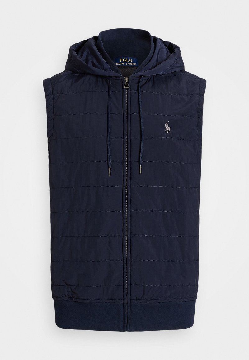 Mörkblå ärmlös pufferväst med dragkedja framtill, huva, ribbad fåll och subtil randig textur. Logotyp på vänster bröst.