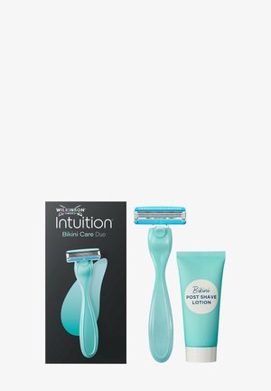 Wilkinson Sword Intuition Bikini Care Duo sisältää turkoosin parranajokoneen, jossa on sisäänrakennettu ajo-osa, sekä siihen sopivan bikinien jälkihoitolotion tuubin.