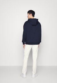 Lindbergh CLASSIC BELT - Vászonnadrágok - cream white