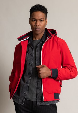 Regenjacke / wasserabweisende Jacke - rot
