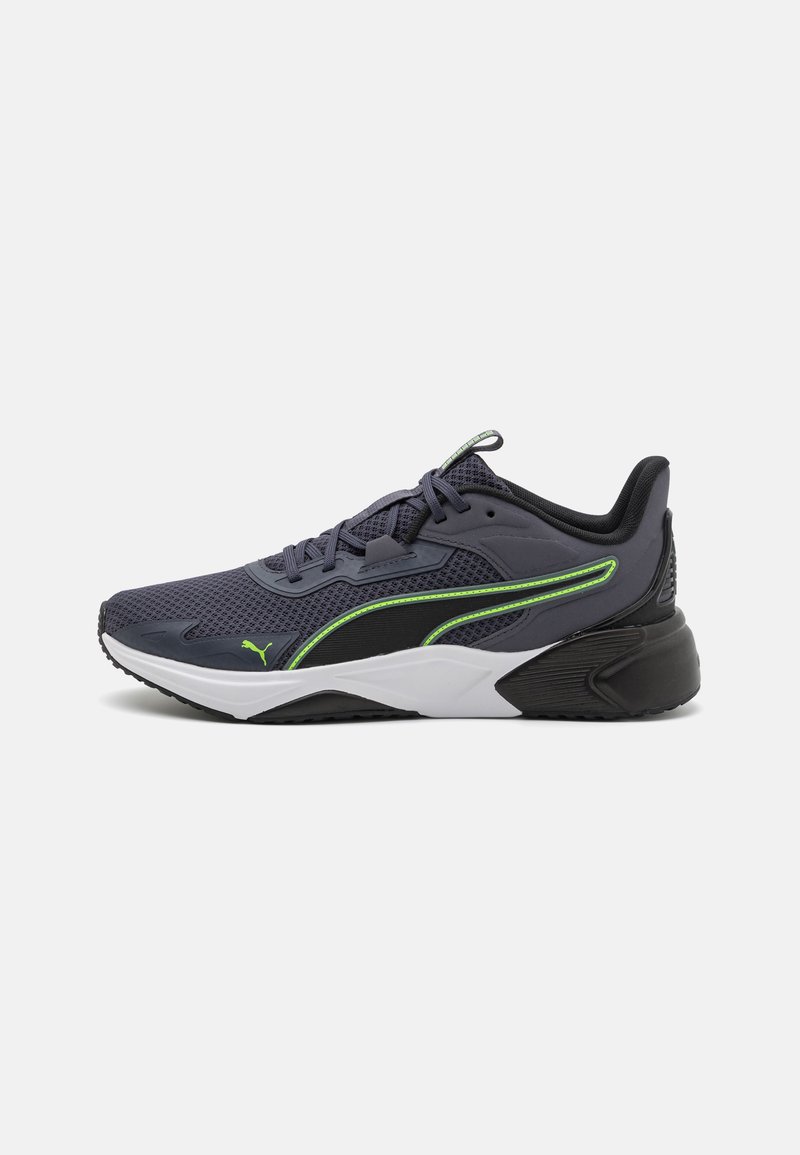 Pantofi sport navy cu partea superioară din plasă, accente verzi și talpă albă. Include un sistem de șireturi și o talpă din cauciuc texturat pentru aderență.