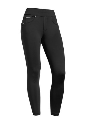 Leggings negros hechos de tela elástica, con cintura alta, dos bolsillos frontales y tachuelas decorativas en los bordes de los bolsillos.