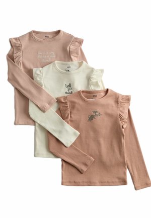 Tre magliette a manica lunga a coste per bambini in beige, crema e brown chiaro, con dettagli a balze sulle spalle e stampe e testi a tema Bambi.