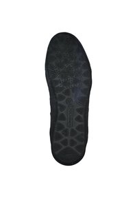 Black rubber shoe sole with a textured pattern of triangles and circles, featuring a prominent logo and drainage holes for breathability.