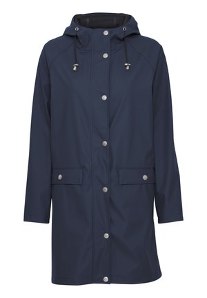 Imperméable bleu marine avec capuche, ferrures argentées, fermetures à pression, deux poches avant et coupe droite avec éléments ajustables au niveau de la capuche.