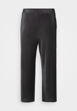 Pantalons noirs côtelés, longueur cheville avec une texture lisse et une taille élastique pour le confort. Présente un design à jambe droite.