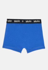 Blå bomullsboxere med svart midje som viser "Molo" i hvit skrift. Glatt tekstur med tettsittende passform og sydd kanter.