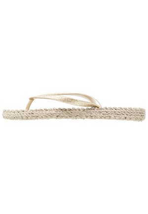 Chinelo beige avec une semelle en jute tressé et des brides dorées métalliques, ornées d'un accent pailleté le long du bord supérieur.