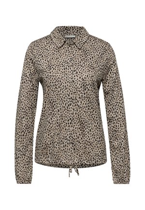 Lange mouw, knoopsluiting overhemd in beige met zwarte luipaardvlekken, met een kraag en een trekkoord onderaan voor verstelbare pasvorm. Soepele textuur.