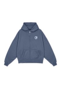 Plavi zip-up dukserica izrađena od pamuka, s kenguruh džepom, širokim rukavima i logotipom na prsima. Mekana tekstura, opušteni dizajn.