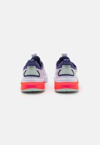 Two pairs of athletic shoes with a white and light blue mesh upper, contrasting purple accents, and a vibrant orange sole.