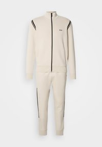 Geselecteerd, open beige