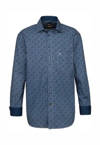 Camicia da uomo a maniche lunghe di colore blu scuro con stampa floreale. Presenta un colletto con bottoni, taschino sul petto e polsini blu a contrasto.