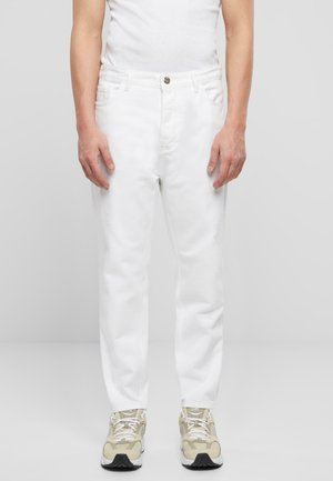 White denim jeans with a straight-leg cut, featuring front pockets, subtle distressed detailing, and a metal button closure at the waist.