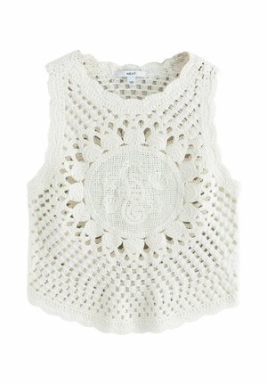 Hvid ærmeløs hækletrøje med solstrålemønster og centralt cirkulært motiv med blomster- og åbent gitterdesign.