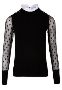 Pull noir à col montant, avec un intérieur blanc froncé et des manches en tulle à pois transparents. Présente des boutons décoratifs aux épaules.