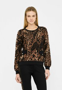Felpa con stampa leopardata in marrone e nero, dotata di tasche frontali e dettagli decorativi, con scollatura rotonda e polsini a coste.