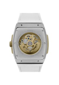 Silberner Edelstahlgehäuse mit transparentem Rücken, goldfarbener Uhrwerk sichtbar im Inneren und einem weißen Gummiarmband mit strukturiertem Design.