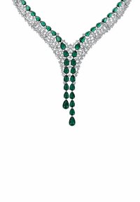 Emerald and clear crystal necklace with an intricate Y-shaped design. Features teardrop-shaped stones and silver accents in a cascading arrangement.