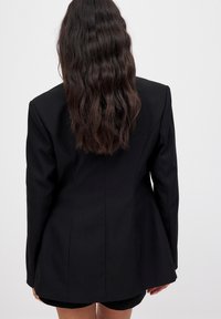 NA-KD Suknjič - black