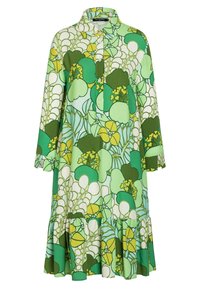 Grön och gul mönstrad klänning med krage, knapplist framtill, trekvartslånga ärmar och volangände. Tillverkad av lätt material.