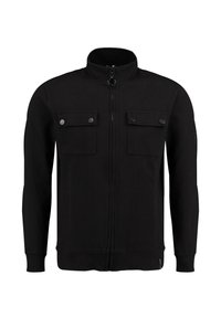 Chaqueta negra con cremallera hecha de un tejido texturizado que presenta un cuello alto, dos bolsillos frontales con botones a presión y puños acanalados.