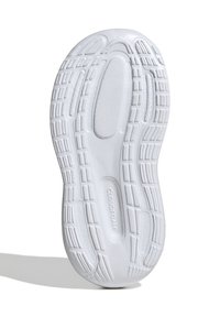 Semelle extérieure de sneaker blanche présentant une surface texturée avec des rainures et motifs, marquée "CLOUDFOAM", conçue pour la traction et le confort.