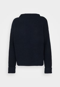 Maglione a maglia blu navy, con un collo alto, texture a costine e maniche lunghe con polsini arrotolati. Vestibilità complessiva rilassata.