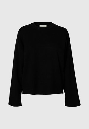 Maglione nero dal taglio morbido, con maniche lunghe, scollatura rotonda e polsini a costine, realizzato in un tessuto morbido e texturizzato.