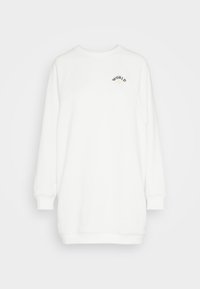 Sudadera blanca con mangas raglán largas, escote redondo y puños de canalé. Presenta un pequeño gráfico de 'WORLD' en el pecho. Tejido suave.