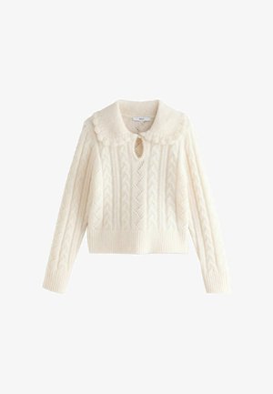 Cream-colored knitted sweater with a scalloped collar, keyhole front, and textured cable patterns. Cropped length and ribbed cuffs.