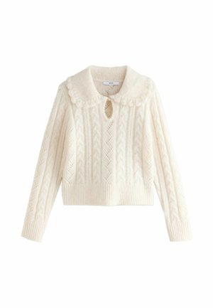 Cream-colored sweater with a textured cable knit design, rounded collar, keyhole neckline, and ribbed hemline. Cropped length.