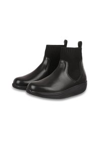 Bottes noires jusqu'à la cheville avec une tige en cuir lisse et des panneaux latéraux en tricot élastique. Bout rond, semelle texturée et anses pour un enfilage facile.