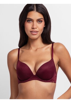 Bordeaux padded bh met verstelbare bandjes, voorzien van een gladde textuur en een diepe halslijn, ontworpen voor een comfortabele pasvorm.