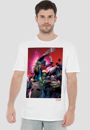 White cotton t-shirt featuring a colorful comic print of Wolverine and other characters on a red background. Short sleeves, relaxed fit.