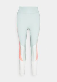 Leggings en verde menta con acentos en coral y blanco. Hechos de material elástico, cuentan con una cintura alta y un diseño elegante con paneles.