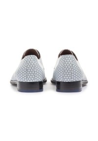 Light blue shoes with hexagonal pattern, smooth texture, and black heel. Rounded toe with a polished finish and subtle blue accents.