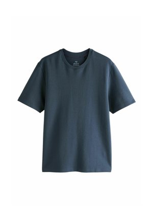 T-shirt en coton bleu marine avec une coupe régulière, manches courtes et col rond. Texture lisse sans motifs ni accents visibles.